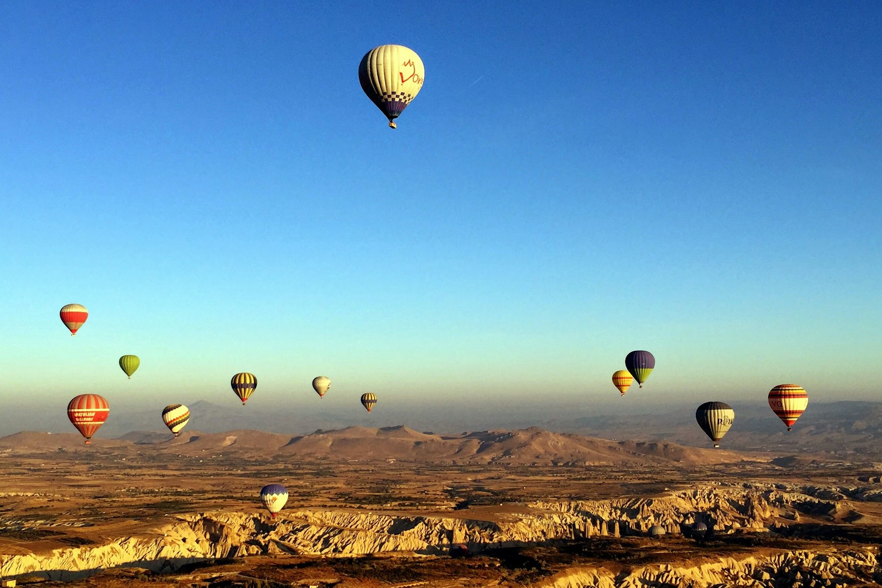 Hot-air balloons floating above Cappadocia in Turkey